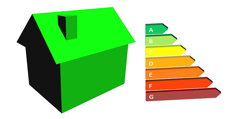 Ilustracija zelene kuće i skale energetske efikasnosti